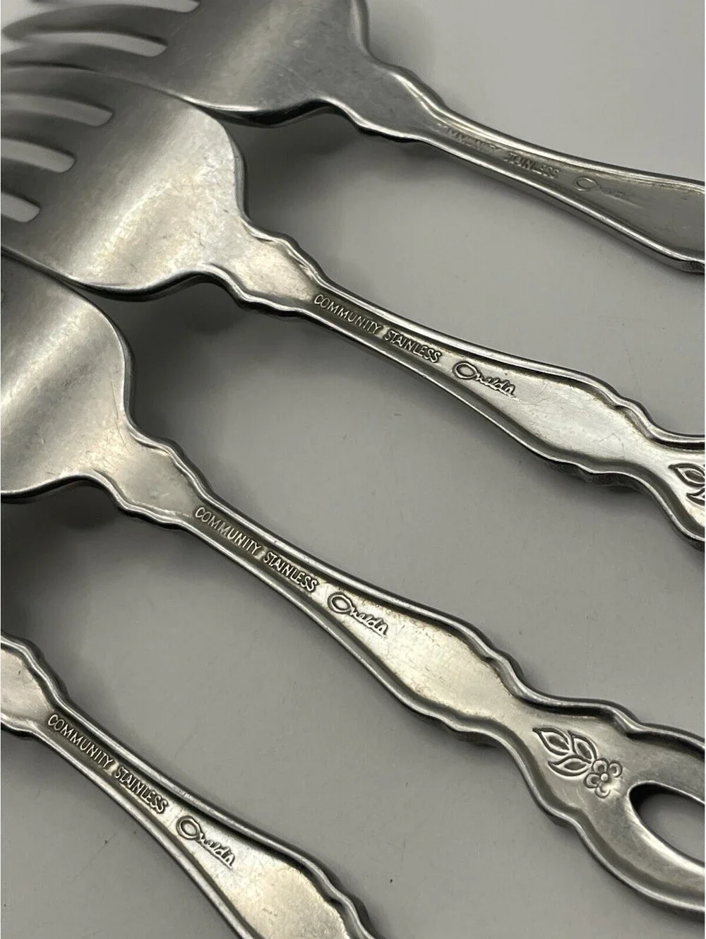 4- Oneida Community FANTASY Burnished Stainless Pierced Hndl Dinner Fork ~7.25”